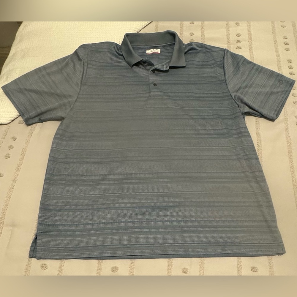 Grand Slam Performance gray and blue men’s polo.
